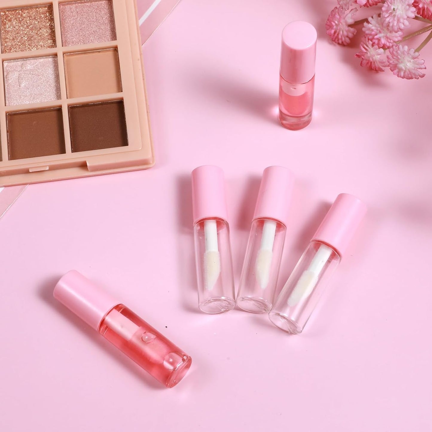 100 Pcs Mini Lip Gloss Tubes, Refillable Lip Balm Bottle Transparent Empty Containers Travel Personal Cosmetic Inserts Cosmetic Tools Mini Lipstick Containers for Women DIY Makeup (Pink)